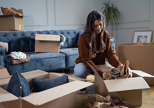 Woman who use a salesforce application to start her lease before moving into a new apartment.