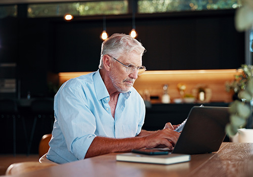 Investor logging into his portal to view his wealth and asset management portfolio.
